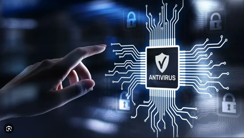 A hand pointing toward a chip marked ANTIVIRUS with a shield and surrounding padlock icons